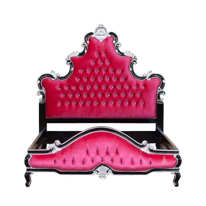 Aphrodite Bed footboard detail showing hand-carved baroque curves and dark gothic timberwork