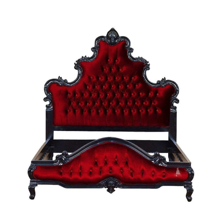 Aphrodite Bed shown with upholstered panels and ornate carved frame in a dark luxury bedroom style