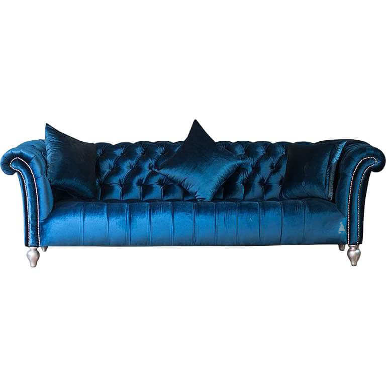 The Aphrodite Chesterfield Lounge, a handcrafted three-seater chesterfield sofa with deep button-tufted upholstery and scrolled arms.