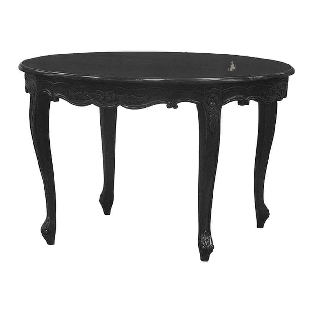 The Aphrodite Dining Table, a handcrafted black gothic dining table with a softly rounded top, carved apron and cabriole legs.