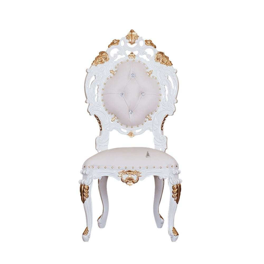 The Aurora Chair, a handcrafted ornate gothic chair with a high carved frame, upholstered seat and button-tufted back.