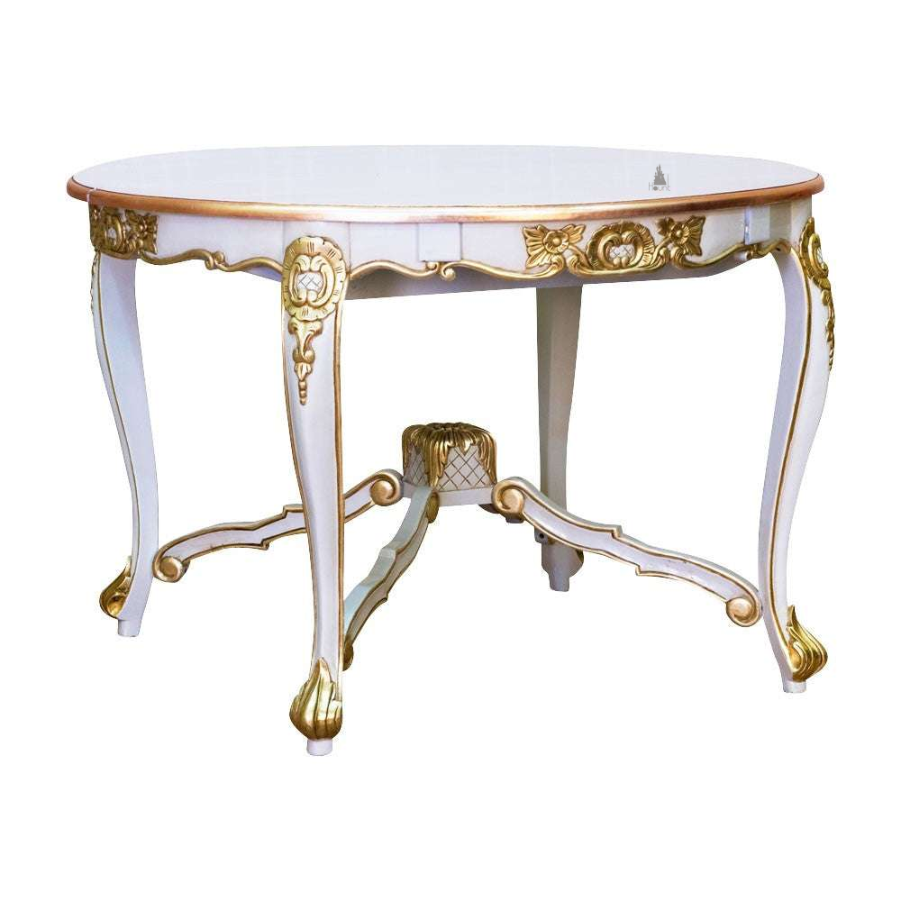 The Cinderella Dining Table, a handcrafted white and gold dining table with ornate detailing, curved legs and a decorative stretcher base.