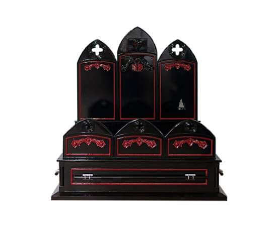 The Crypt Keeper Casket Bed, a handcrafted coffin-inspired gothic bed with arched headboard panels, red trim and cross details.