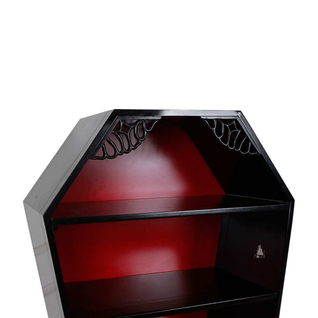 The Crypt Keeper Coffin Bookcase, a handcrafted coffin-shaped open bookcase with tapered silhouette and multiple display shelves.