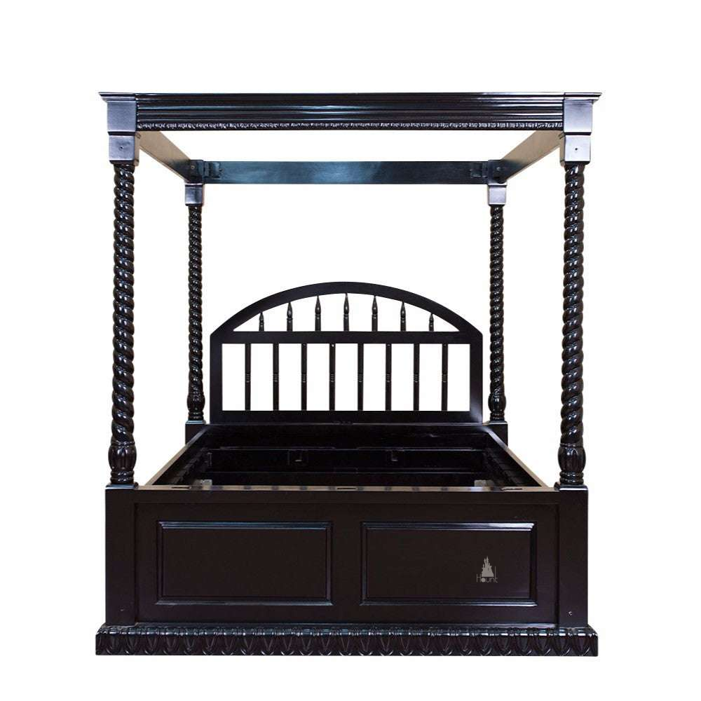 The Dark Desires Shackled Bed, a BDSM-inspired handcrafted four poster bed with barley-twist posts, tester frame and arched barred headboard.