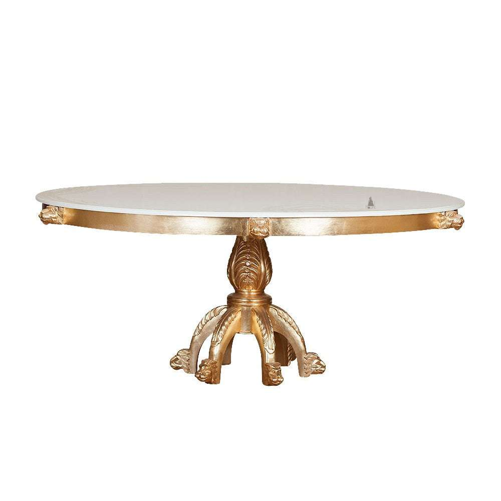 The Emperor Round Dining Table, a handcrafted round dining table with a large top and sculptural central pedestal base.