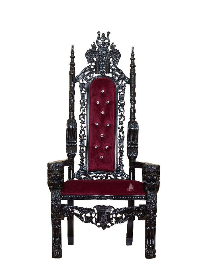 The Emperor Throne, a handcrafted gothic throne chair with a tall openwork back, crown-like cresting and upholstered back and seat panels.