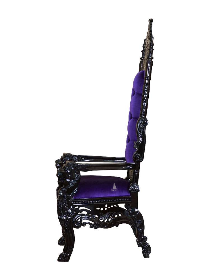 The Emperor Throne, a handcrafted gothic throne chair with a tall openwork back, crown-like cresting and upholstered back and seat panels.