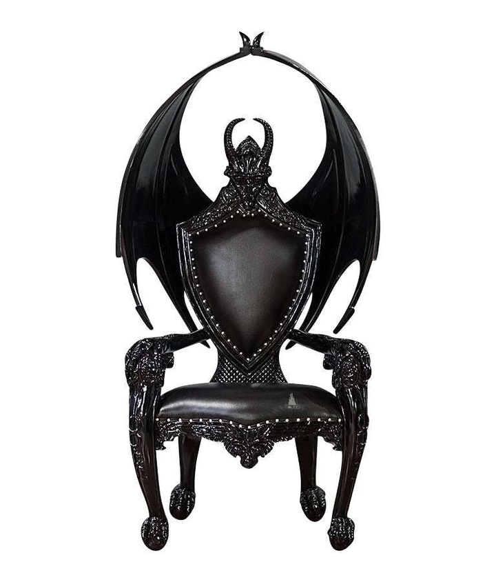 The House of Fire Throne, a handcrafted gothic throne chair with a bat-wing frame, horned carved crest and shield-shaped upholstered back.