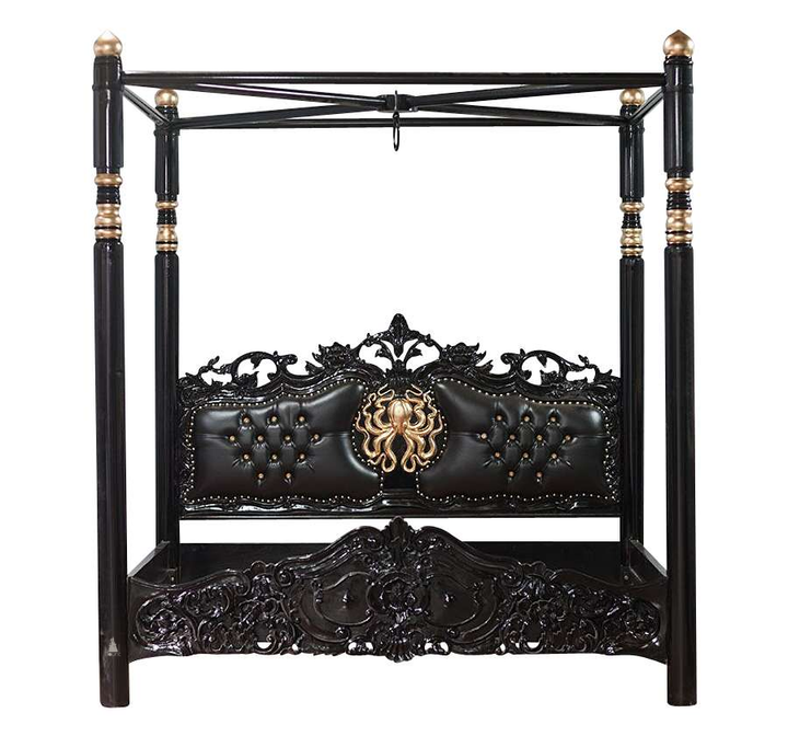 Black gothic four-poster bed with a tufted headboard, carved footboard and gold octopus motif.