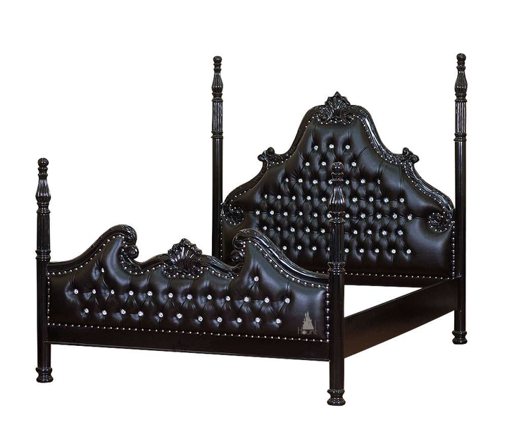 Side angle of the Luxe Bed showing the carved footboard, upholstered headboard and four poster bed structure