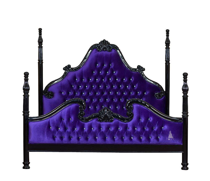 Luxe Bed shown with button-tufted upholstery and dark carved mahogany frame