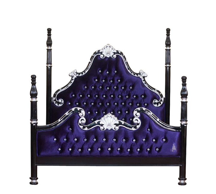 Luxe Bed detail showing deep button tufting, carved mahogany edging and gothic four poster proportions