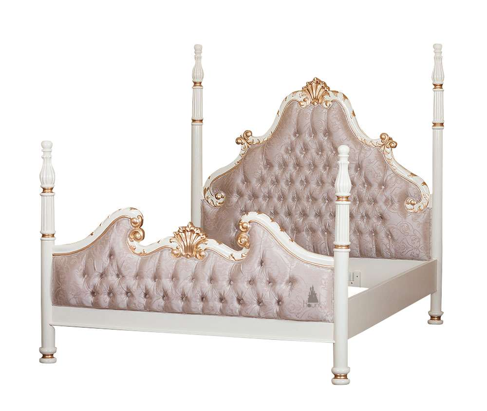 Luxe Bed shown with upholstered panels and dark carved mahogany four poster frame