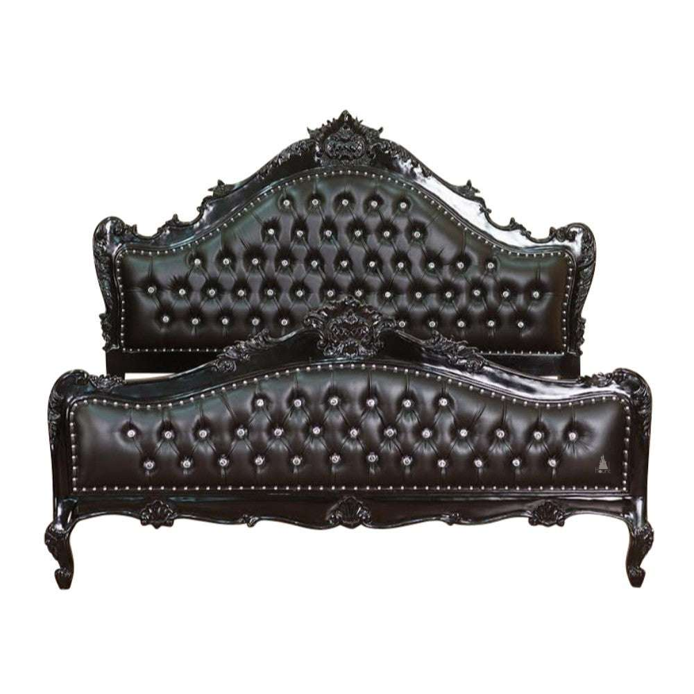 The Mafia Bed, a handcrafted upholstered statement bed with deep button tufting, serpentine lines and carved crest detailing.
