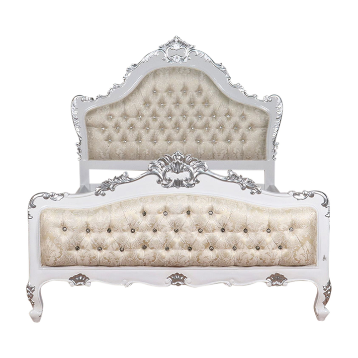 The Mafia Bed, a handcrafted upholstered statement bed with deep button tufting, serpentine lines and carved crest detailing.