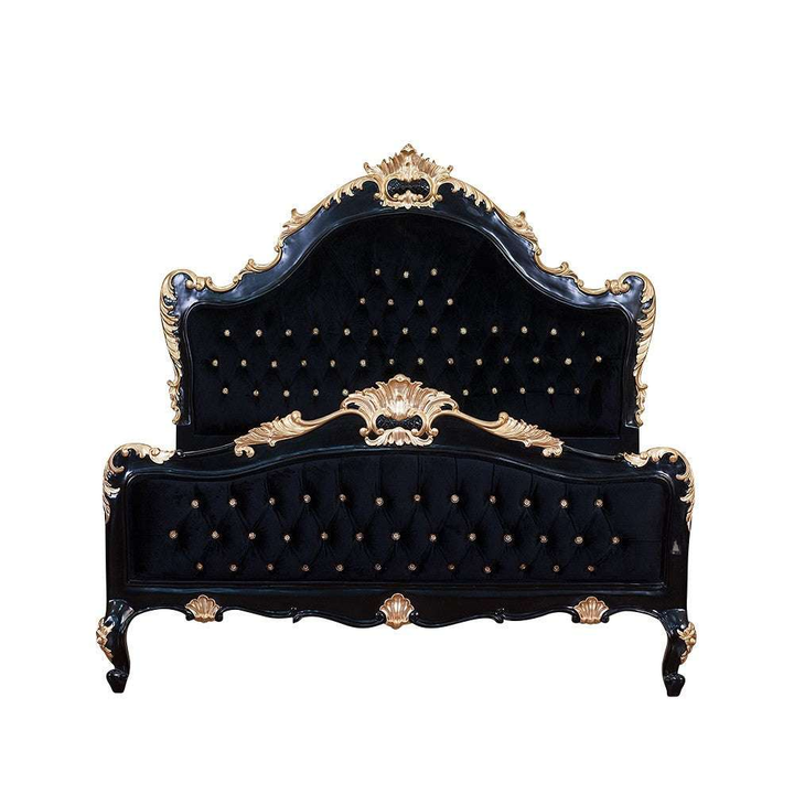 The Mafia Bed, a handcrafted upholstered statement bed with deep button tufting, serpentine lines and carved crest detailing.