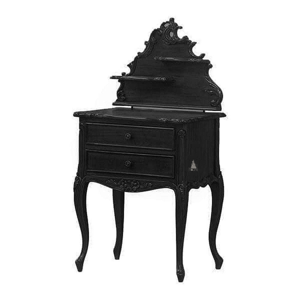 The Maleficent Side Table, a handcrafted black side table with two drawers, a decorative back panel and carved legs.