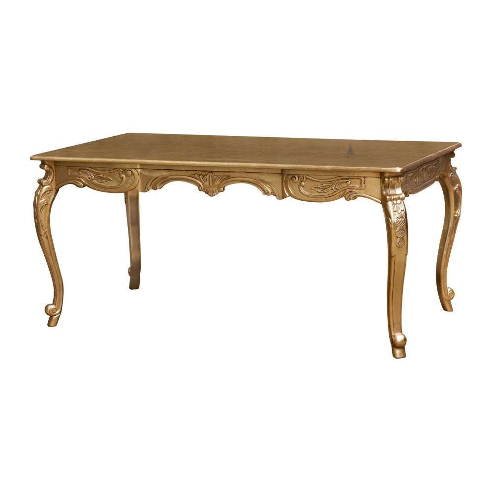 The Nymph Dining Table, a handcrafted carved dining table with a warm timber finish, decorative apron and graceful legs.