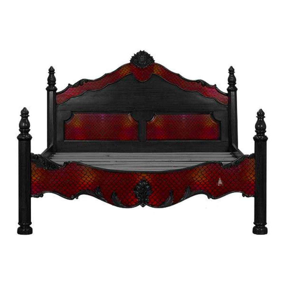 Odyssey Bed shown with red upholstered fabric inlay set inside a dark carved gothic timber frame