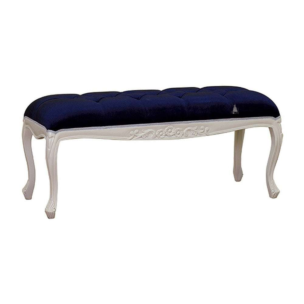 Poison Ivy Bench, a long upholstered bench with a button-tufted seat, carved apron detail and slim cabriole legs