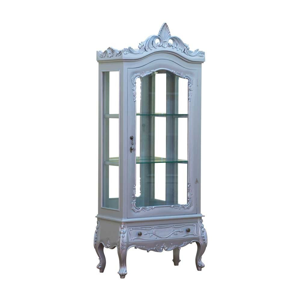 Poison Ivy Display Cabinet, a tall, slender glass-fronted cabinet with a carved crest, a single drawer below and delicate cabriole legs
