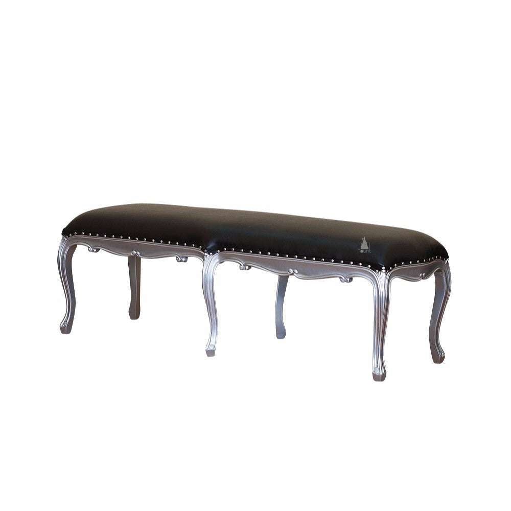 Another view of the Poseidon Bench, a long upholstered bench with a smooth padded top