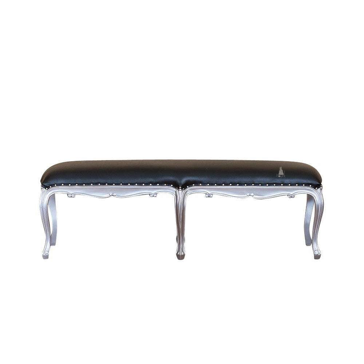 Another view of the Poseidon Bench, a long upholstered bench with a smooth padded top
