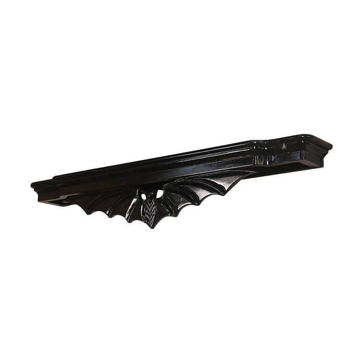 Another view of the Queen of the Damned Bed Crown, a glossy black wall-mounted bed crown with a carved bat-wing form