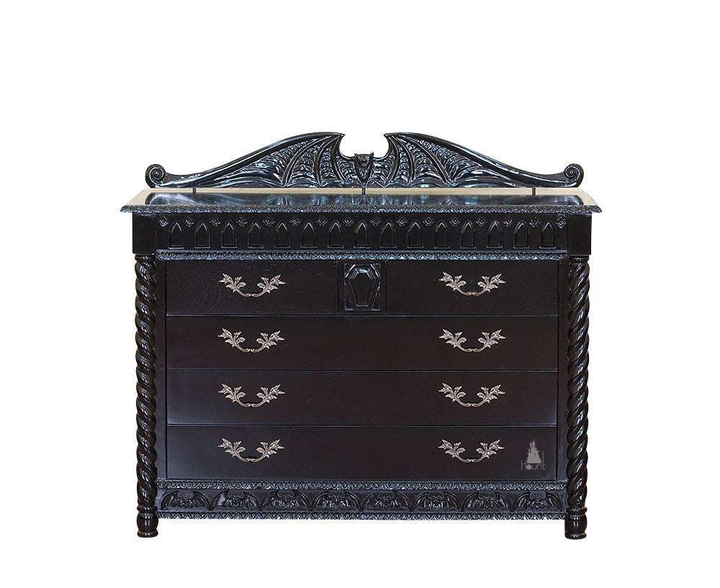 Queen of the Damned Cathedral Dresser, a black chest of drawers crowned with a carved bat-wing crest and framed by twisted columns on either side