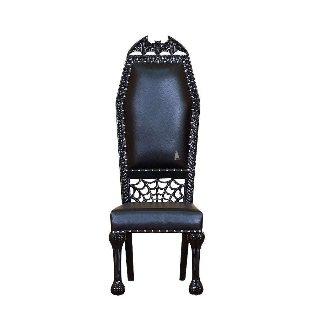 Queen of the Damned Chair, a tall gothic dining chair with a coffin-like back shape, black upholstery and a bat-wing crown at the top