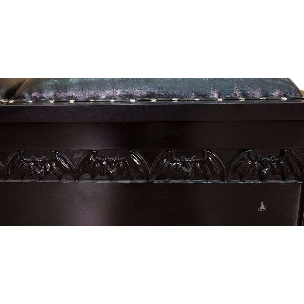 Another view of the Queen of the Damned Coffin Blanket Box, a wide storage chest with a dark coffin-inspired form and two padded lid sections