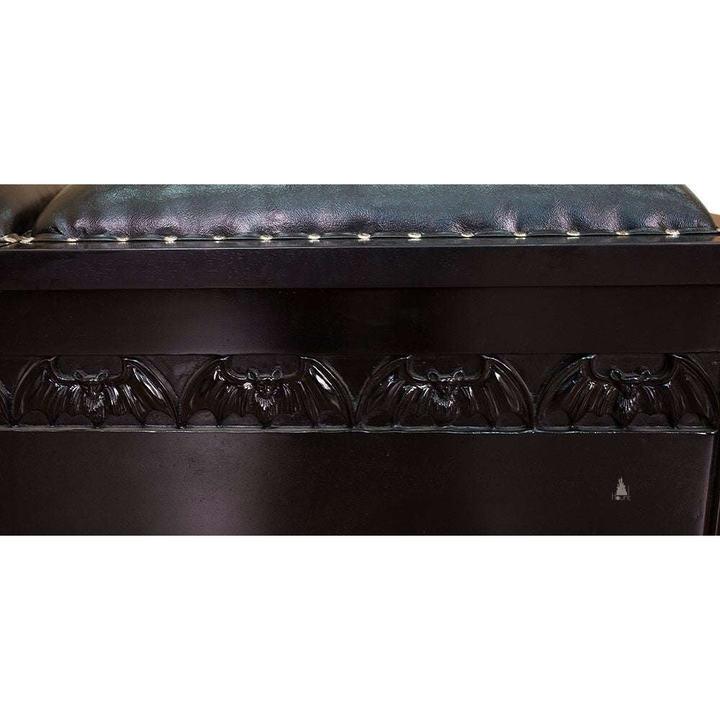 Another view of the Queen of the Damned Coffin Blanket Box, a wide storage chest with a dark coffin-inspired form and two padded lid sections