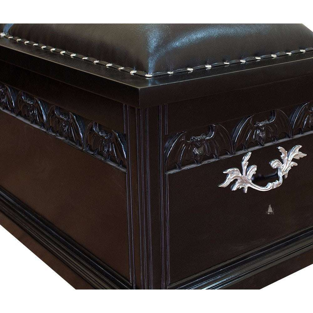 Another view of the Queen of the Damned Coffin Blanket Box, a wide storage chest with a dark coffin-inspired form and two padded lid sections