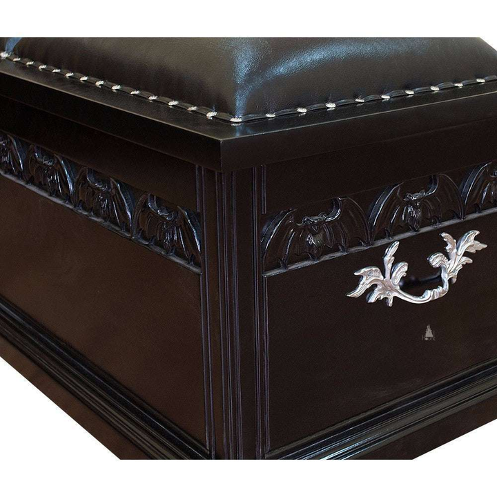 Another view of the Queen of the Damned Coffin Blanket Box, a wide storage chest with a dark coffin-inspired form and two padded lid sections