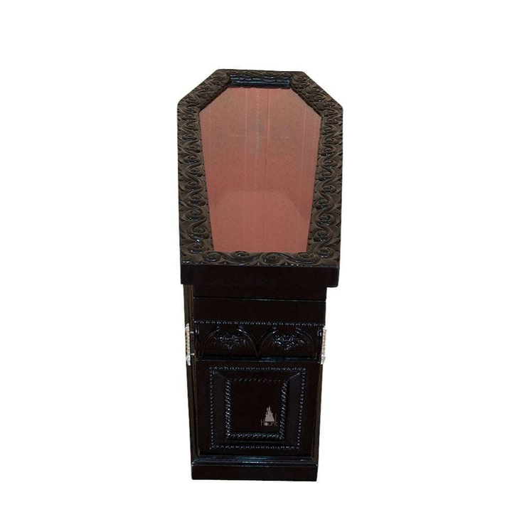 The Queen of the Damned Coffin Coffee Table, a handcrafted coffin-shaped coffee table with framed drawers and an opening glass-topped storage compartment.