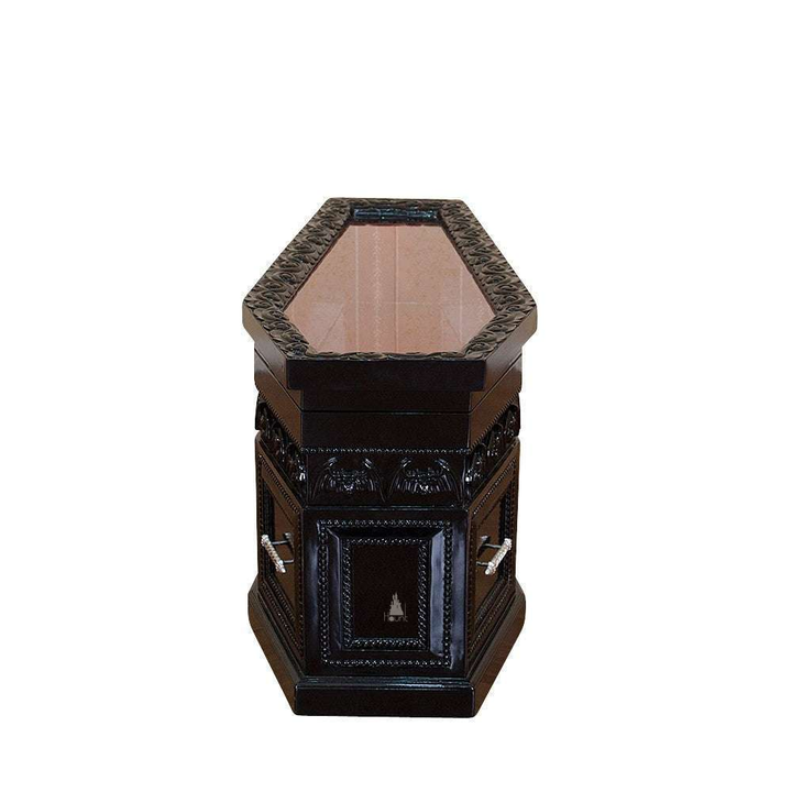 The Queen of the Damned Coffin Coffee Table, a handcrafted coffin-shaped coffee table with framed drawers and an opening glass-topped storage compartment.