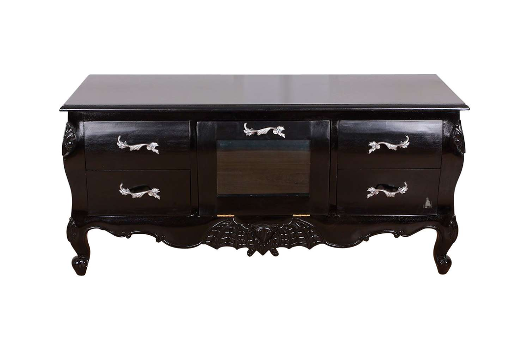 The Queen of the Damned TV Cabinet, a handcrafted gothic media cabinet with curved legs, multiple drawers and a central open shelf.