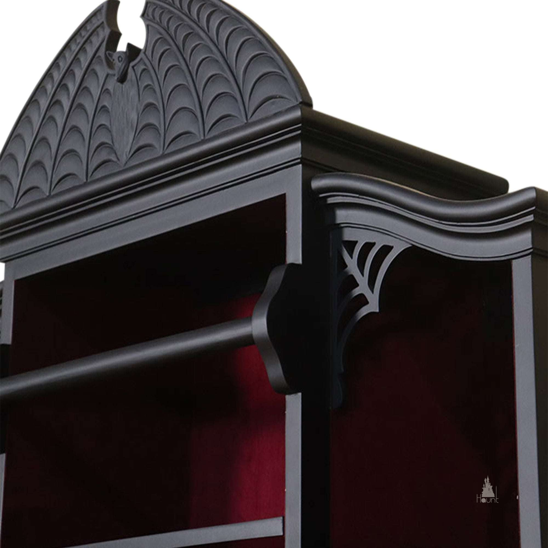 Another view of the Queen of the Damned Webbed Bookcase, a tall black gothic bookcase with a red interior