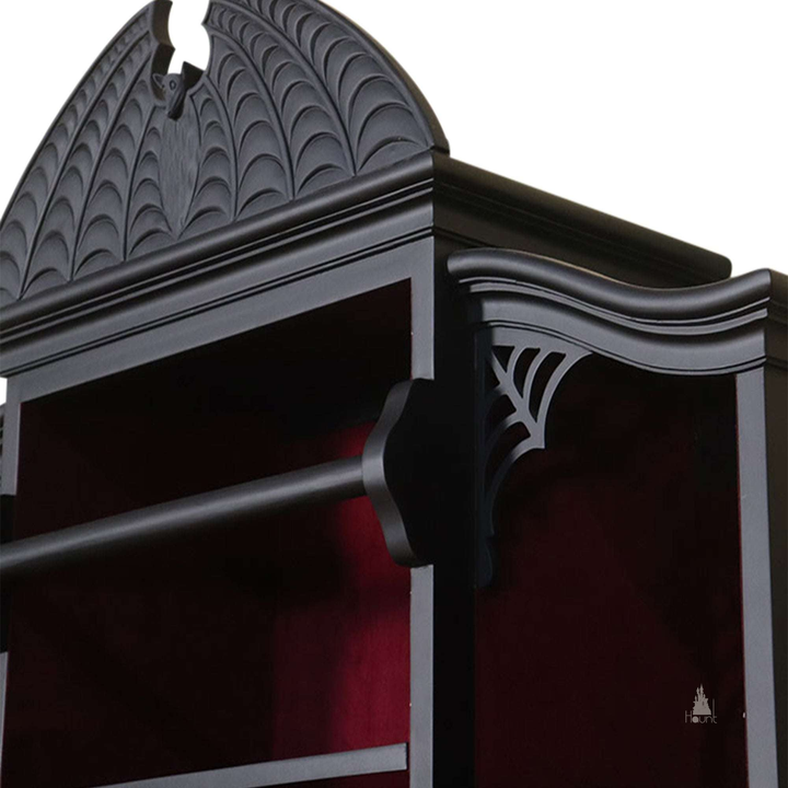 Another view of the Queen of the Damned Webbed Bookcase, a tall black gothic bookcase with a red interior