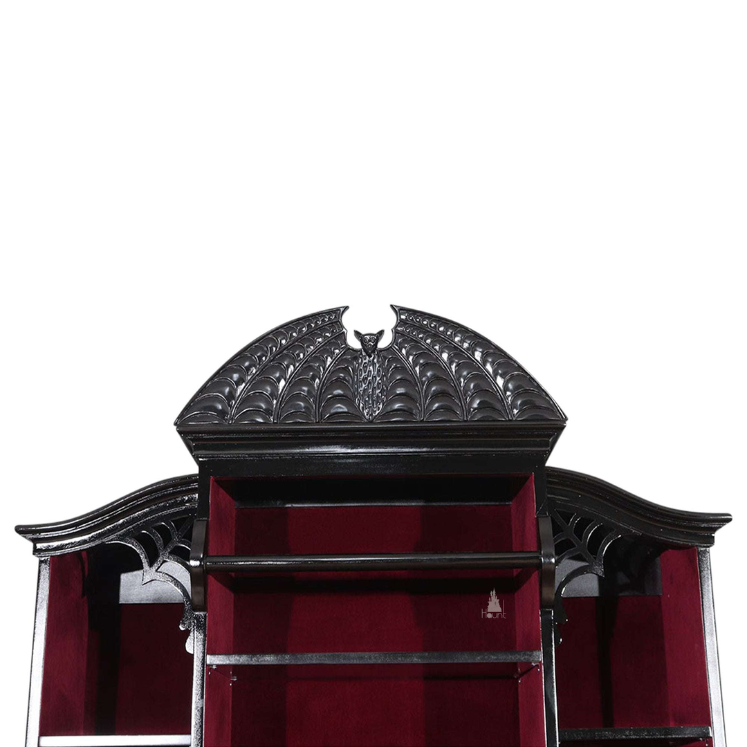 Another view of the Queen of the Damned Webbed Bookcase, a tall black gothic bookcase with a red interior