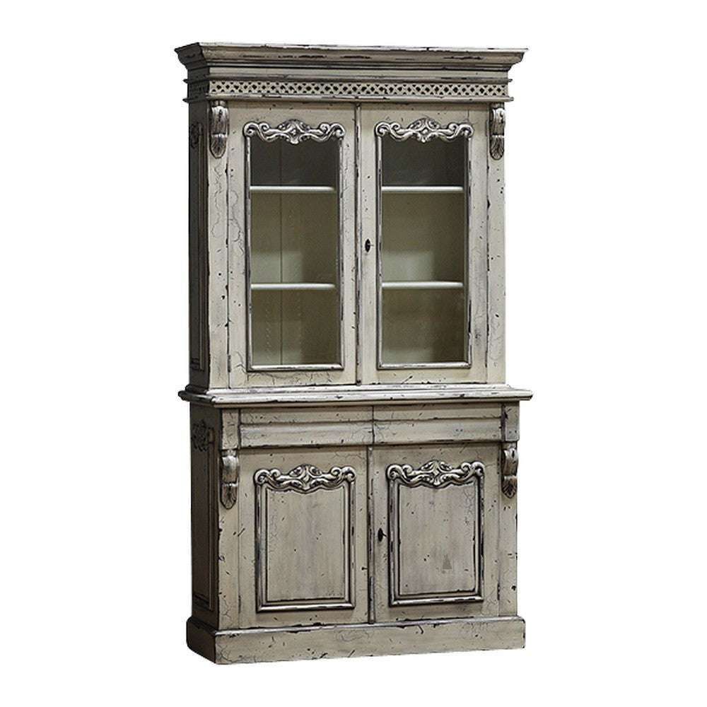 Relic Bookcase, a tall display cabinet with glass-panelled upper doors, lower enclosed storage and a distressed antique-style finish