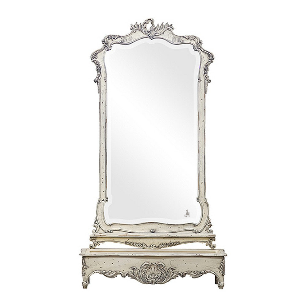 Relic Pyrmira Mirror, a tall floor-standing mirror set in an ornately carved frame, with a decorative crest and a substantial carved base