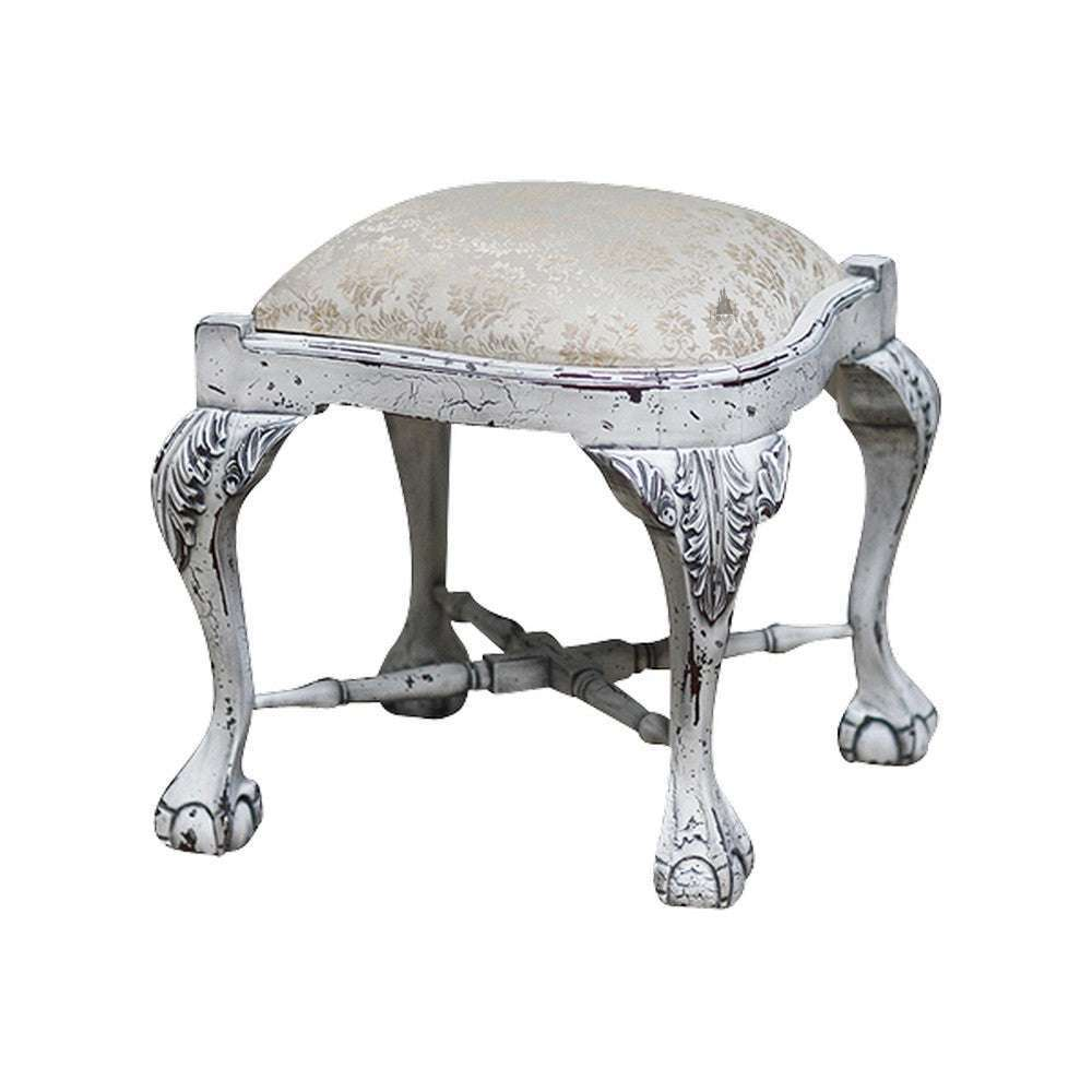 Another view of the Relic Stool, a compact upholstered stool with a rounded cushion
