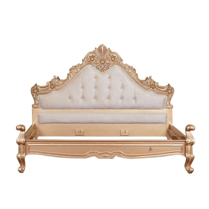 The Seduce Bedazzled Bed, a handcrafted gothic bed with ornate carved cresting, diamond-tufted upholstery and a low shaped footboard.