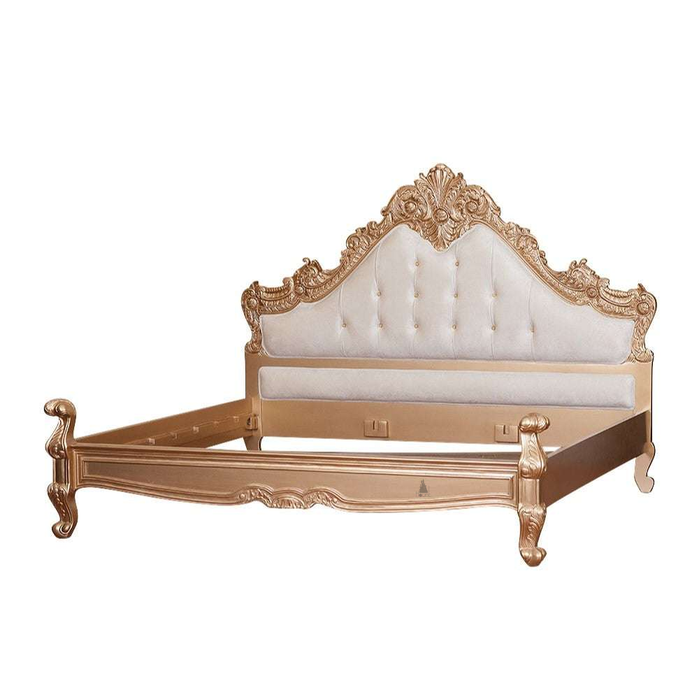 The Seduce Bedazzled Bed, a handcrafted gothic bed with ornate carved cresting, diamond-tufted upholstery and a low shaped footboard.