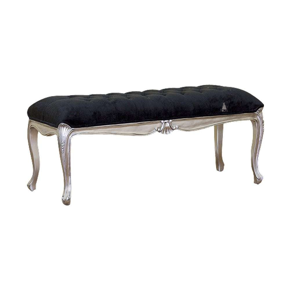 Another view of the Seduce Bench, a long upholstered bench with a black button-tufted cushion