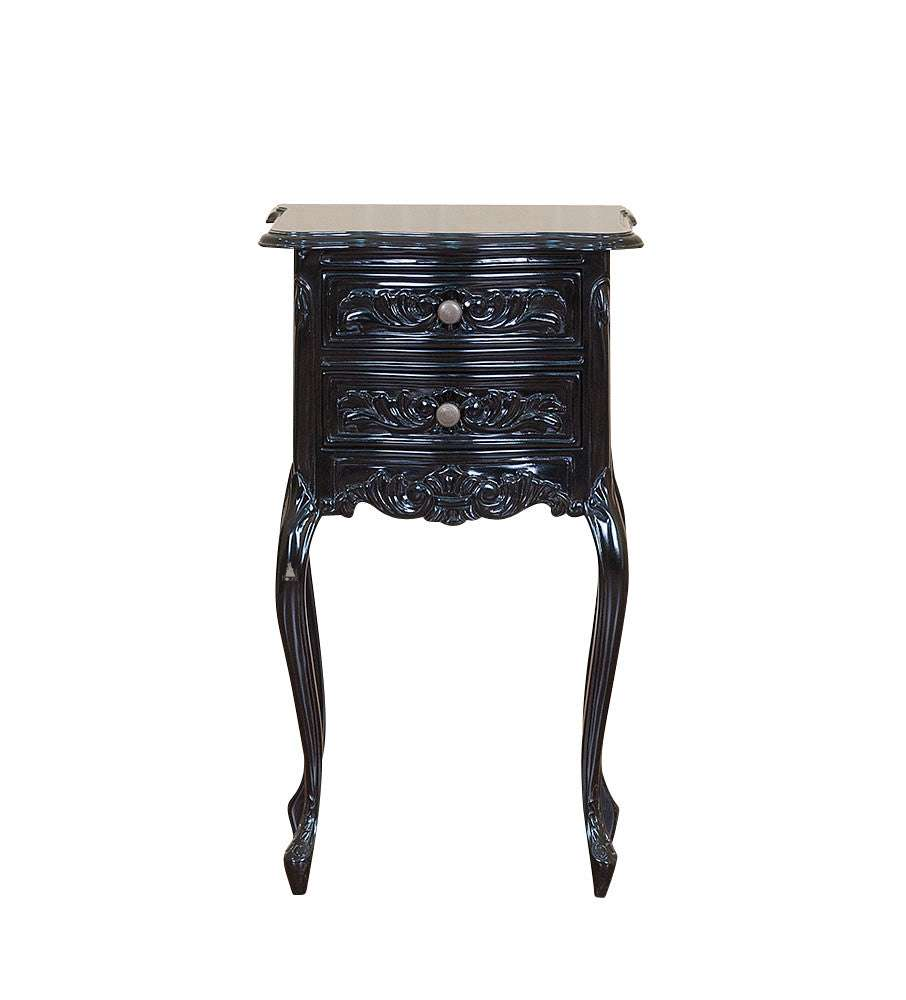 The Seduce Side Table, a handcrafted black side table with two drawers, carved drawer fronts and slim curving legs.