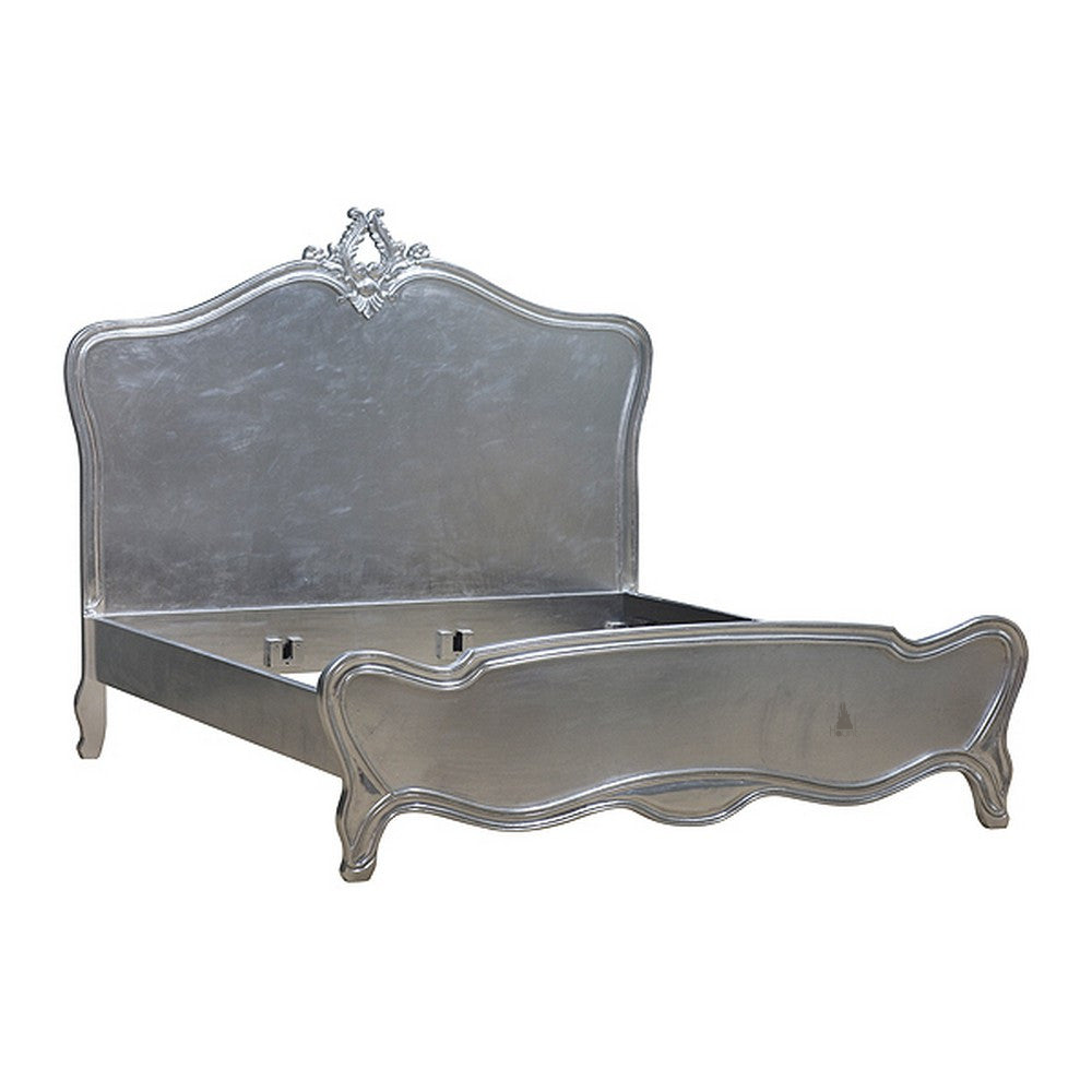 The Space Cadet Bed, a handcrafted French provincial-style bed with a tall shaped headboard, low serpentine footboard and cabriole-style legs.