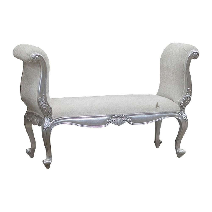 Temptress Bench by Haunt Cult, a pale silver bench with high scroll-shaped end rests, cream upholstered panels, curved cabriole legs and carved shell details along the frame